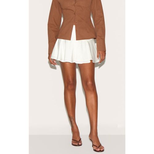 Mini-jupe trapèze fluide satinée - PrettyLittleThing - Modalova