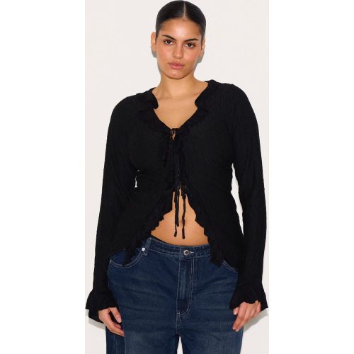 Plus Top en maille tricot texturée volanté noué devant - PrettyLittleThing - Modalova