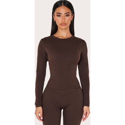 Petite Top de sport en Sculpt à manches longues - PrettyLittleThing - Modalova