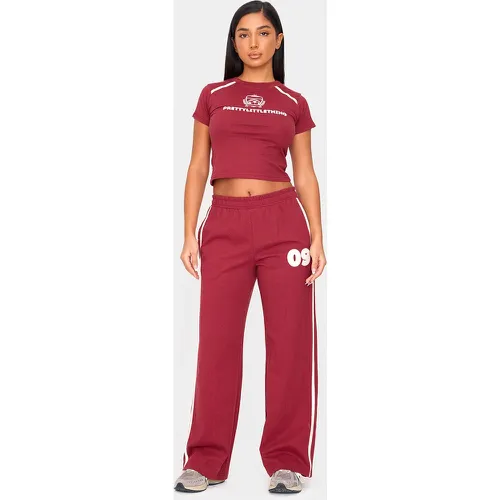 Petite Jogging droit imprimé "Sports" - PrettyLittleThing - Modalova