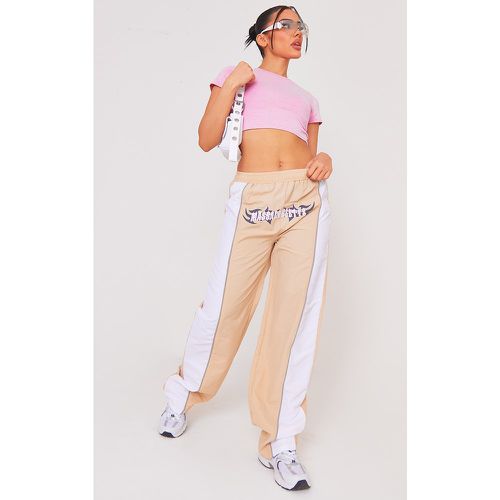 Pantalon de sport style parachute à imprimé devant - PrettyLittleThing - Modalova