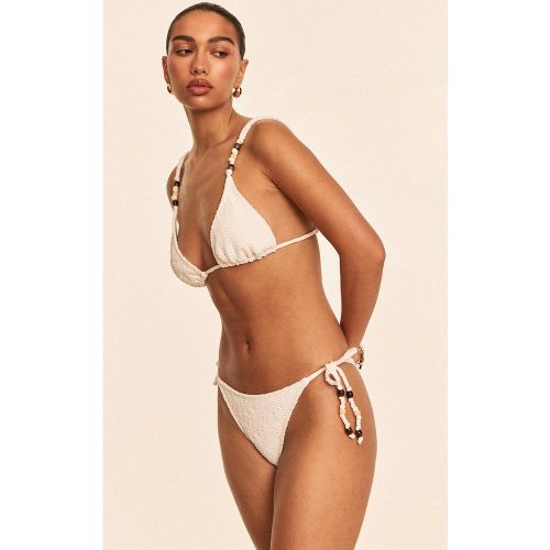 Bas de maillot de bain texturé noué sur les côtés à perles - PrettyLittleThing - Modalova