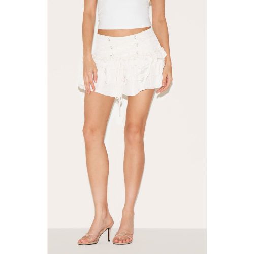 Mini-jupe volantée à lacets devant - PrettyLittleThing - Modalova