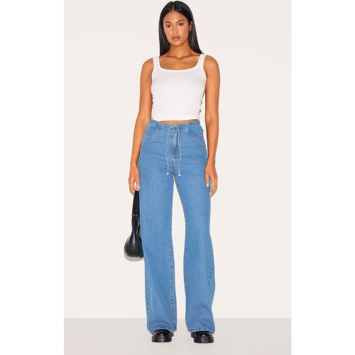 Tall Jean large délavé bleu moyen à ceinture nouée et taille basse - PrettyLittleThing - Modalova