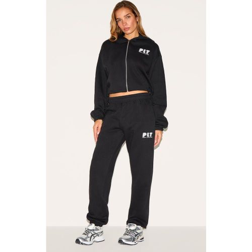 Jogging oversize resserré aux chevilles - PrettyLittleThing - Modalova