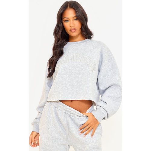 PLT Tall Sweat court style universitaire effiloché - PrettyLittleThing - Modalova