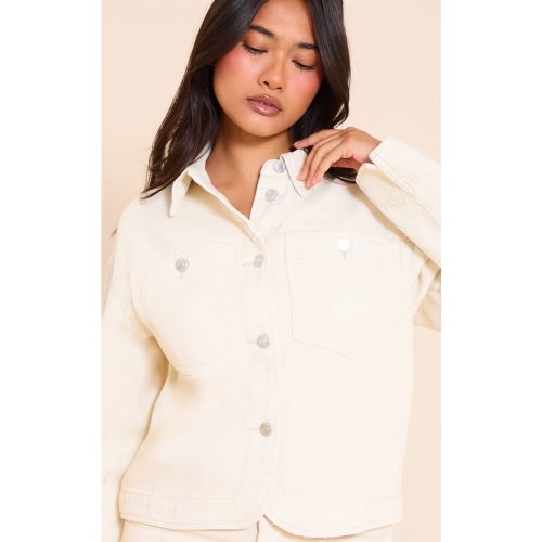 Veste en jean à épaules carrées et oulret incurvé - PrettyLittleThing - Modalova