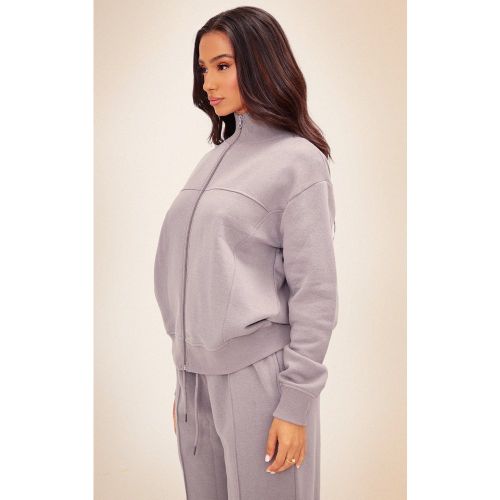 Petite Top de course gris anthracite à coutures surjetées et zip - PrettyLittleThing - Modalova