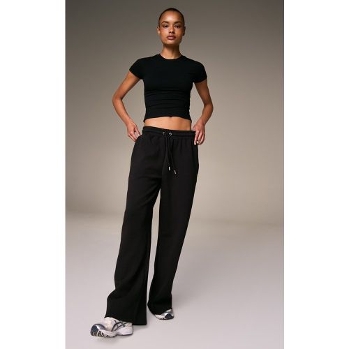 Jogging large doublé à logo brodé - PrettyLittleThing - Modalova