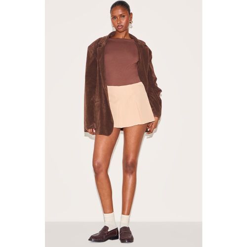 Jupe-short de tailleur patineuse tissée à plis creux - PrettyLittleThing - Modalova