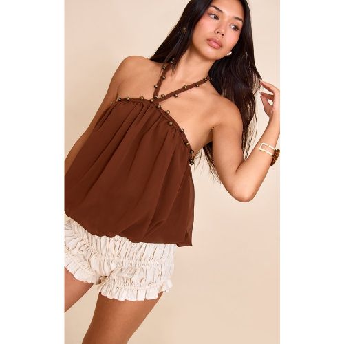 Top en mousseline de soie à détails tressés et ourlet bouffant - PrettyLittleThing - Modalova