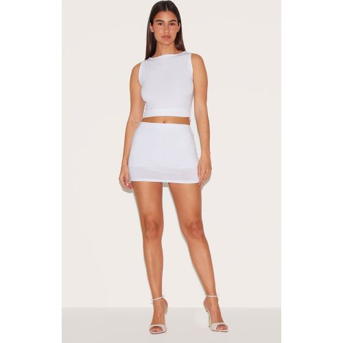 Mini jupe-short basique blanche moulante à taille basse - PrettyLittleThing - Modalova