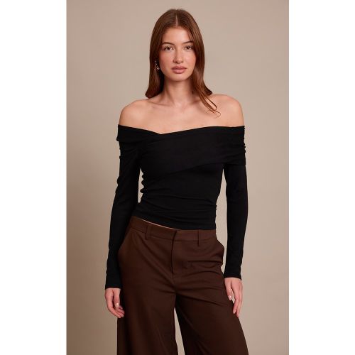 Top en maille tricot à épaules asymétriques et manches longues | Taille Large - PrettyLittleThing - Modalova