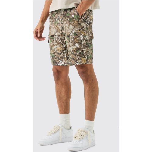 Short cargo large à imprimé camouflage - 30 - Boohooman - Modalova