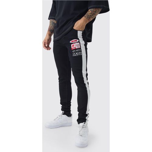 Jean skinny stretch à écusson moto - 28R - Boohooman - Modalova