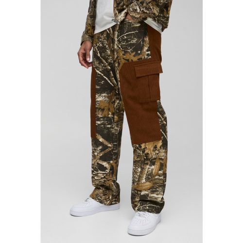 Pantalon large en velours côtelé à imprimé camouflage - 28R - Boohooman - Modalova