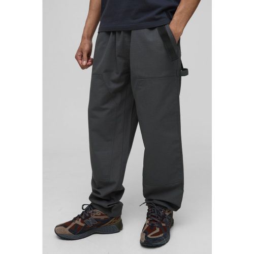 Pantalon large déchiré à taille élastiquée - S - Boohooman - Modalova