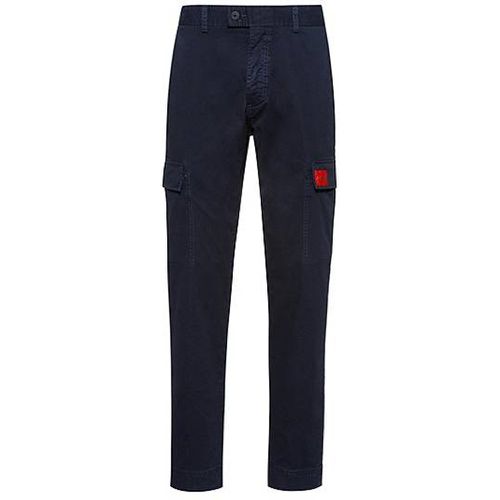 Pantalon Slim Fit avec poches à rabat et étiquette logo - HUGO - Modalova