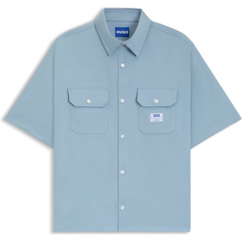 Chemise Oversize en twill de coton avec patch logoté - HUGO - Modalova