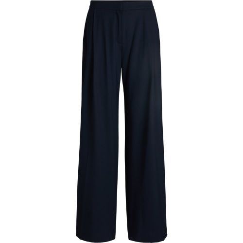 Pantalon regular plissé sur le devant - HUGO - Modalova