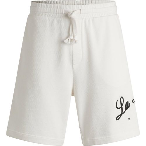 Short en molleton de coton avec logo artistique - HUGO - Modalova