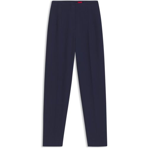 Pantalon Regular à la coupe carotte en tissu stretch - HUGO - Modalova