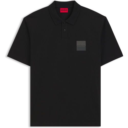 Polo Relaxed en coton avec logo revisité - HUGO - Modalova