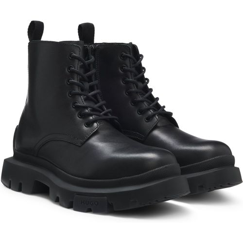 Bottines en cuir à lacets et semelle épaisse - HUGO - Modalova