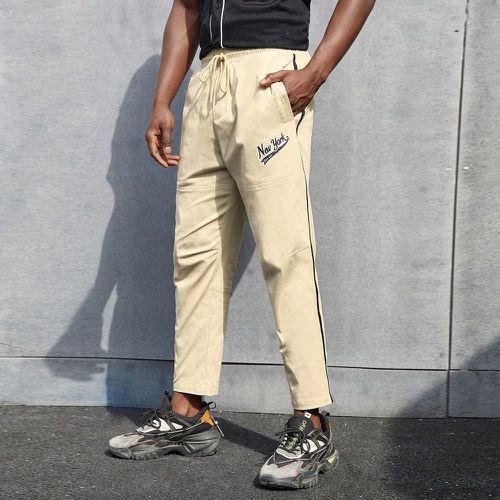 Pantalon à lettres à poche avec bande latérale - SHEIN - Modalova