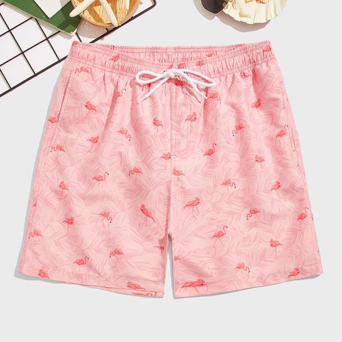 Short de bain rose clair imprimé palmiers