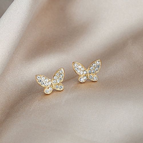Clous d'oreilles à strass à design papillon - SHEIN - Modalova