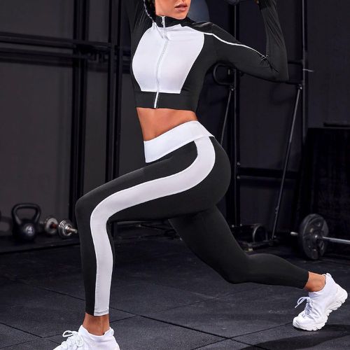Veste de sport bicolore à couture zippé court avec leggings - SHEIN - Modalova