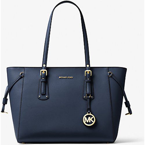 MK Sac à main Voyager de taille moyenne en cuir grainé - Michael Kors - MICHAEL Michael Kors - Modalova