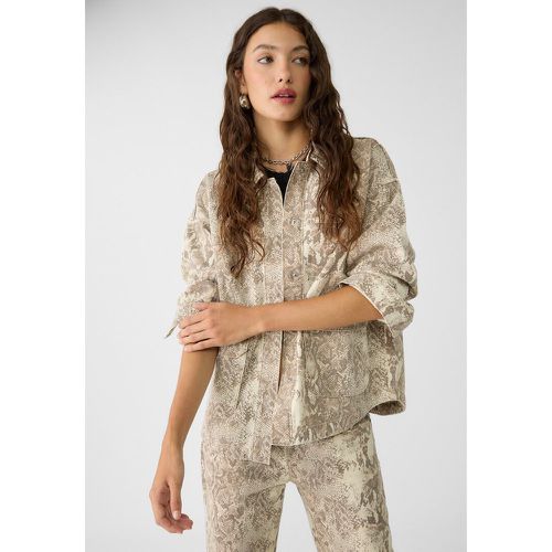 Surchemise cargo avec poche à imprimé animal XS - Stradivarius - Modalova