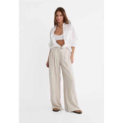 Pantalon palazzo fluide texturé 40 - Stradivarius - Modalova