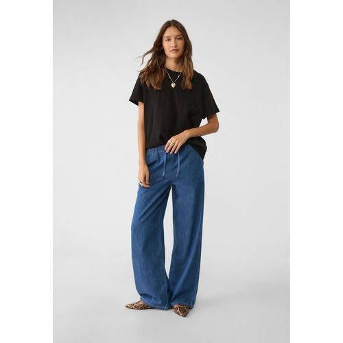 Pantalon large fluide en jean M - Stradivarius - Modalova