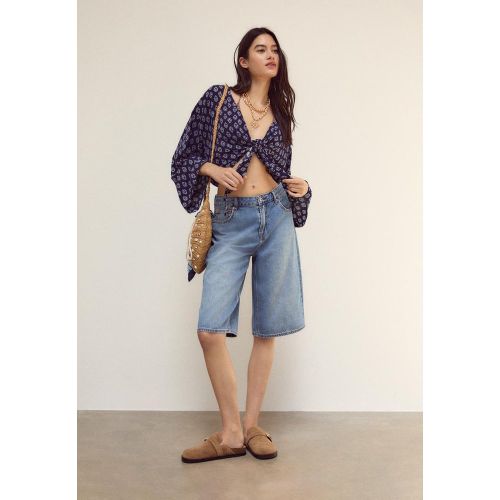 Blouse fluide à nœud XS - Stradivarius - Modalova