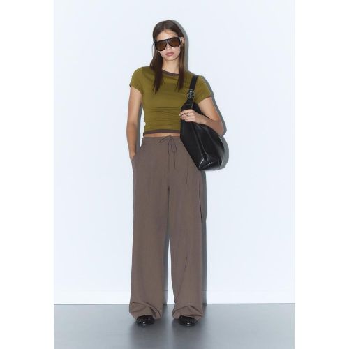 Pantalon habillé pinces cordons 34 - Stradivarius - Modalova