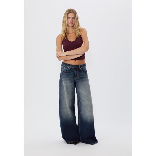 D66 Jeans super large taille basse DENIM BLEU MOYEN DÉLAVÉ 32 - Stradivarius - Modalova