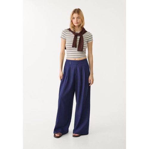 Pantalon fluide à pinces en lin mélangé 32 - Stradivarius - Modalova