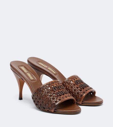 Miu Miu Mules en cuir tressé - Miu Miu - Modalova