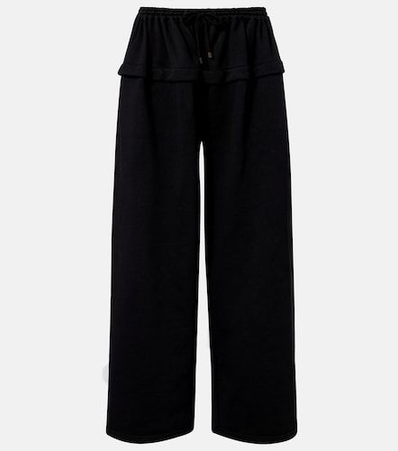 Alaïa Pantalon de survêtement ample en coton - Alaia - Modalova