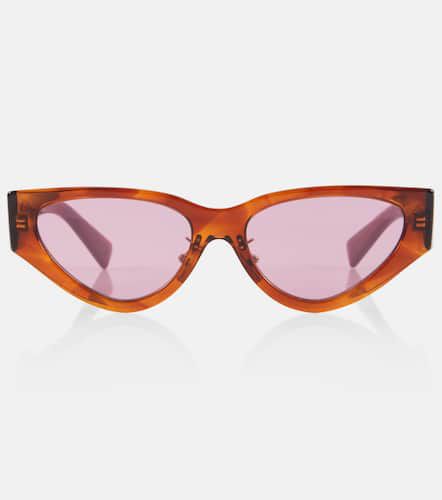 Lunettes de soleil œil-de-chat à logo - Miu Miu - Modalova