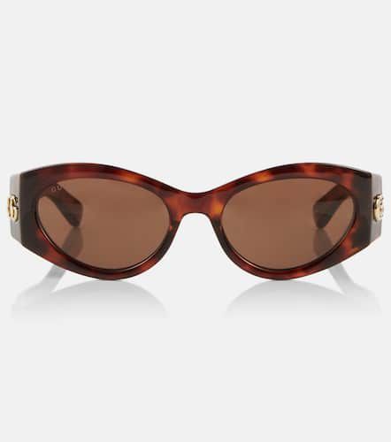 Gucci Lunettes de soleil ovales GG - Gucci - Modalova