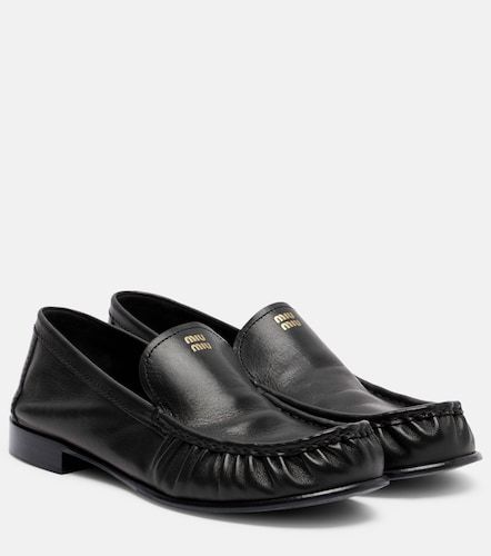 Miu Miu Mocassins en cuir à logo - Miu Miu - Modalova