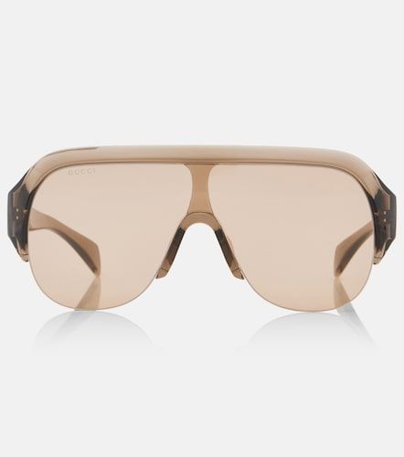 Gucci Lunettes de soleil à logo - Gucci - Modalova