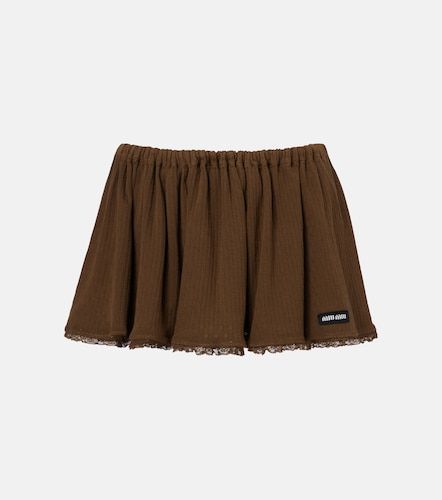 Mini-jupe en coton pointelle à dentelle - Miu Miu - Modalova