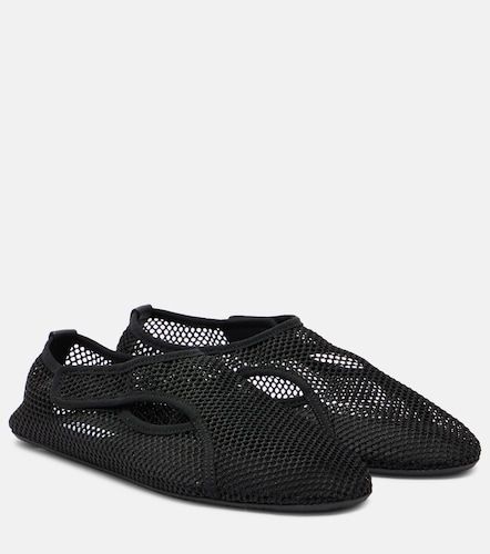 Alaïa Slip-on en résille - Alaia - Modalova