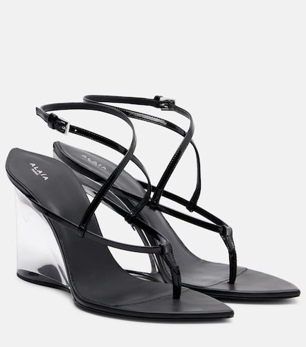 Alaïa Sandales compensées en cuir verni - Alaia - Modalova