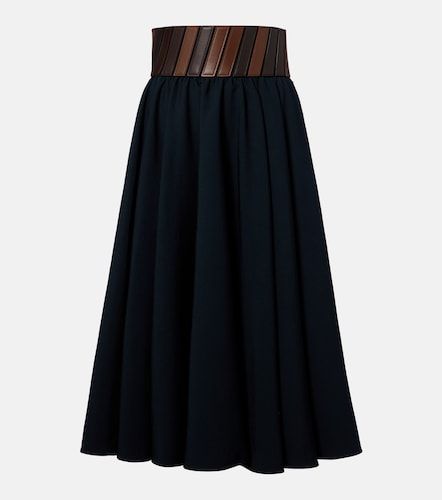 Alaïa Jupe midi en laine et cuir - Alaia - Modalova